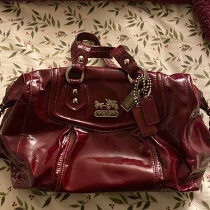 COACH patent leather bag. Gorgeous rich color with burgundy colored lining.